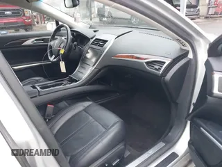 2016 Lincoln MKZ with VIN 3LN6L2GK3GR603308, listed as a IAAI auction lot 41454792 with 77,758 mi miles. Bid and sale history available at carsss.com. Image 5.
