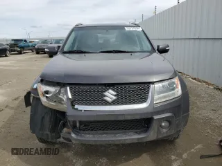 2012 Suzuki Grand Vitara Limited z VIN JS3TD0D74C4100965, wystawiony jako Copart lot #52727894 z przebiegiem 150 760 mil mil oraz Szkoda całkowita • Salvage title. Historia ofert i sprzedaży dostępna na DreamBid. Obrazek 5.