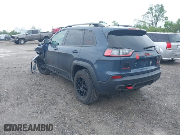 2019 Jeep Cherokee Trailhawk z VIN 1C4PJMBX1KD364100, wystawiony jako IAAI lot #42264518 z przebiegiem 117 020 mil mil oraz . Historia ofert i sprzedaży dostępna na DreamBid. Obrazek 3.