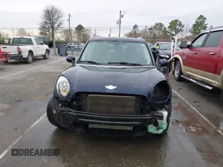 2013 MINI Countryman S ALL4 z VIN WMWZC5C51DWM15816, wystawiony jako IAAI lot #41734311 z przebiegiem 134 636 mil mil oraz . Historia ofert i sprzedaży dostępna na DreamBid. Obrazek 12.