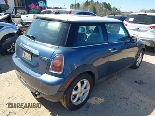2009 MINI Cooper Hardtop with VIN WMWMF33549TW79871, listed as a IAAI auction lot 41844591 with 236,255 mi miles. Bid and sale history available at carsss.com. Image 4.