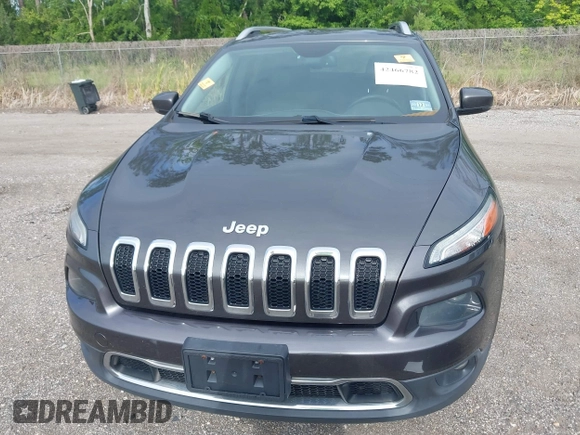 2014 Jeep Cherokee Limited z VIN 1C4PJMDSXEW294199, wystawiony jako IAAI lot #42466782 z przebiegiem 137 783 mil mil oraz . Historia ofert i sprzedaży dostępna na DreamBid. Obrazek 6.