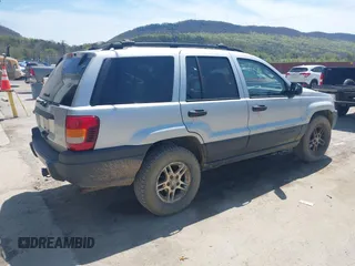 2004 Jeep Grand Cherokee Laredo with VIN 1J4GW48S14C377204, listed as a IAAI auction lot 42087966 with 78,110 mi miles. Bid and sale history available at carsss.com. Image 4.