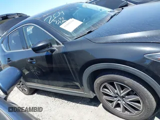 2018 Mazda CX-5 Grand Touring with VIN JM3KFADM4J0326760, listed as a IAAI auction lot 41885100 with 82,091 mi miles and . Bid and sale history available at DreamBid. Image 13.