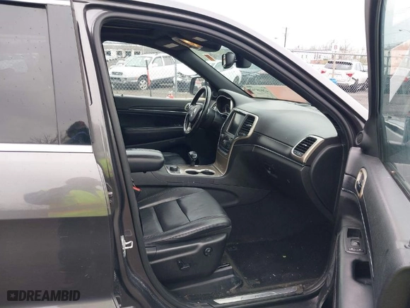 2014 Jeep Grand Cherokee Limited with VIN 1C4RJFBG8EC172946, listed as a IAAI auction lot 42048712 with 157,150 mi miles. Bid and sale history available at carsss.com. Image 5.