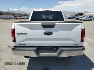 2016 Ford F-150 XLT with VIN 1FTEW1EF7GKE64263, listed as a Copart auction lot 70331214 with 260,006 mi miles and Salvage title. Bid and sale history available at DreamBid. Image 6.