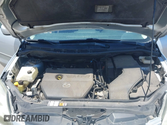 2009 Mazda 5 Sport with VIN JM1CR293990334438, listed as a IAAI auction lot 42561953 with 118,178 mi miles and . Bid and sale history available at DreamBid. Image 10.