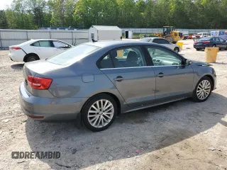 2015 Volkswagen Jetta SE z VIN 3VWD17AJ5FM309965, wystawiony jako Copart lot #54930665 z przebiegiem 141 918 mil mil oraz Szkoda całkowita • Salvage title. Historia ofert i sprzedaży dostępna na DreamBid. Obrazek 3.