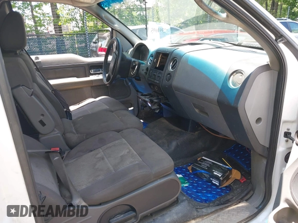 2004 Ford F-150 STX with VIN 1FTRX12W24NC08853, listed as a IAAI auction lot 42391695 with Not provided miles and . Bid and sale history available at DreamBid. Image 5.