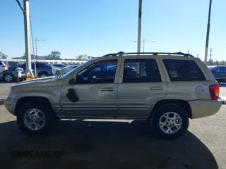 1999 Jeep Grand Cherokee Limited with VIN 1J4GW68NXXC727844, listed as a IAAI auction lot 41290773 with 222,838 mi miles. Bid and sale history available at carsss.com. Image 15.