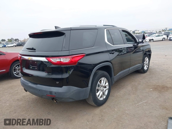2018 Chevrolet Traverse LT Cloth z VIN 1GNERGKW4JJ127889, wystawiony jako IAAI lot #42368681 z przebiegiem 65 438 mil mil oraz . Historia ofert i sprzedaży dostępna na DreamBid. Obrazek 4.