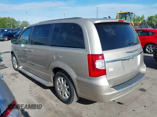 2013 Chrysler Town & Country Touring with VIN 2C4RC1BGXDR646625, listed as a IAAI auction lot 42248297 with 141,943 mi miles and . Bid and sale history available at DreamBid. Image 3.