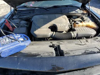 2015 Dodge Challenger SXT Plus with VIN 2C3CDZBG3FH744233, listed as a Copart auction lot 87718665 with 238,748 mi miles and Salvage Title. Bid and sale history available at carsss.com. Image 11.