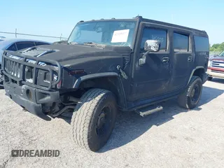 2003 Hummer H2 z VIN 5GRGN23UX3H140510, wystawiony jako IAAI lot #42325527 z przebiegiem 140 010 mil mil oraz . Historia ofert i sprzedaży dostępna na DreamBid. Obrazek 18.