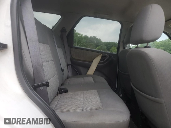 2006 Ford Escape XLT с VIN 1FMYU93116KA71488, выставлен на аукционе Copart как лот 57489755 с пробегом 197 006 миль миль и Списание • Salvage title. История ставок и продаж доступна на DreamBid. Изображение 11.