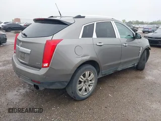 2012 Cadillac SRX Luxury Collection with VIN 3GYFNAE33CS587208, listed as a IAAI auction lot 42142976 with 218,380 mi miles and . Bid and sale history available at carsss.com. Image 4.