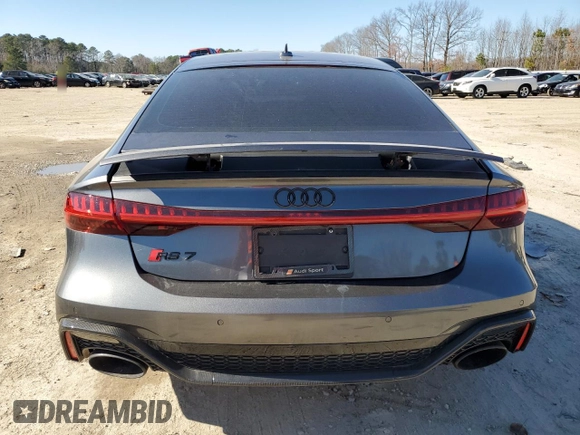 2022 Audi RS 7 z VIN WUAPCBF22NN912345, wystawiony jako Copart lot #41202044 z przebiegiem 5076 mil mil oraz Szkody całkowita. Historia ofert i sprzedaży dostępna na DreamBid. Obrazek 6.