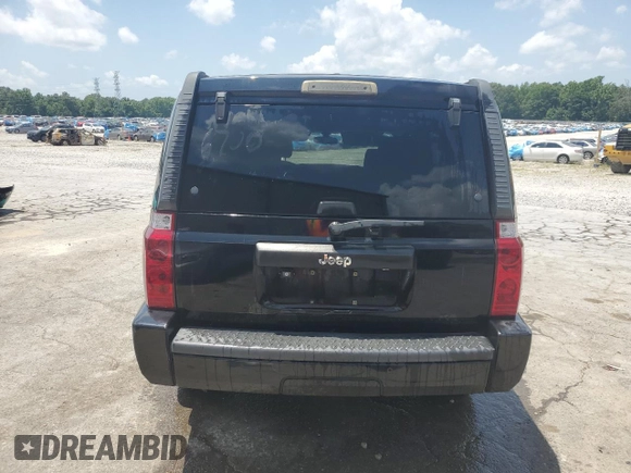 2008 Jeep Commander Sport z VIN 1J8HH48K58C126172, wystawiony jako Copart lot #61961285 z przebiegiem 235 022 mil mil oraz Szkoda całkowita • Salvage title. Historia ofert i sprzedaży dostępna na DreamBid. Obrazek 6.