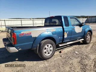 2003 Nissan Frontier XE with VIN 1N6ED26Y93C468148, listed as a Copart auction lot 76468404 with 178,257 mi miles and Salvage title. Bid and sale history available at DreamBid. Image 3.