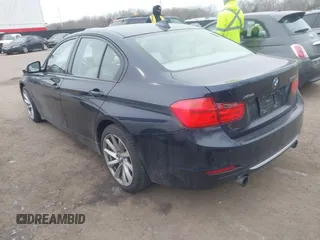 2013 BMW 3 Series 335i xDrive with VIN WBA3B9C50DJ899068, listed as a IAAI auction lot 41331622 with 156,216 mi miles. Bid and sale history available at carsss.com. Image 3.