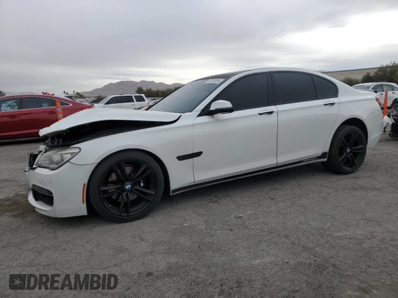 2013 BMW 7 Series 740i with VIN WBAYA6C55DC995290, listed as a Copart auction lot 82022284 with 128,882 mi miles and Salvage Title. Bid and sale history available at carsss.com. Image 1.
