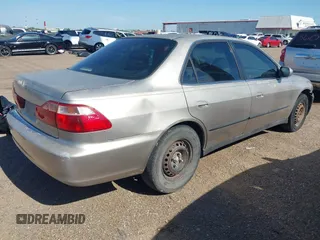 1998 Honda Accord LX with VIN 1HGCG5542WA266612, listed as a IAAI auction lot 42208066 with 202,101 mi miles and . Bid and sale history available at DreamBid. Image 4.
