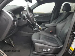 2020 BMW X4 xDrive30i z VIN 5UX2V1C08L9B97027, wystawiony jako Copart lot #50574175 z przebiegiem 124 221 mil mil oraz Szkoda całkowita • Salvage title. Historia ofert i sprzedaży dostępna na DreamBid. Obrazek 7.