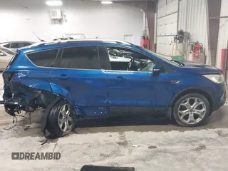 2018 Ford Escape Titanium with VIN 1FMCU9J99JUB94925, listed as a IAAI auction lot 42412800 with 95,880 mi miles and . Bid and sale history available at DreamBid. Image 14.