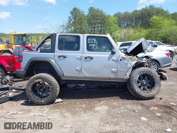 2018 Jeep Wrangler Unlimited Sport S z VIN 1C4HJXDG9JW150509, wystawiony jako IAAI lot #41989409 z przebiegiem Nie podano mil oraz . Historia ofert i sprzedaży dostępna na DreamBid. Obrazek 13.