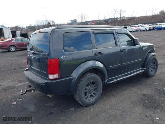 2011 Dodge Nitro SE with VIN 1D4PU2GK0BW541350, listed as a IAAI auction lot 41653467 with 207,940 mi miles. Bid and sale history available at carsss.com. Image 4.