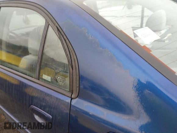 2003 Honda Civic LX with VIN 2HGES165X3H564619, listed as a IAAI auction lot 42017947 with 125,518 mi miles. Bid and sale history available at carsss.com. Image 15.