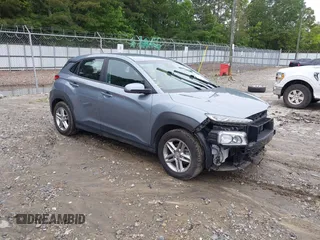 2021 Hyundai Kona SE z VIN KM8K12AAXMU646441, wystawiony jako IAAI lot #42334090 z przebiegiem 71 358 mil mil oraz . Historia ofert i sprzedaży dostępna na DreamBid. Obrazek 1.