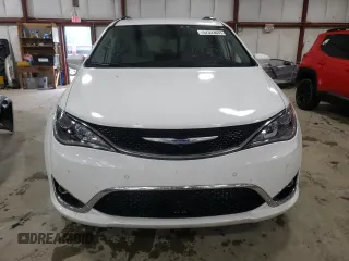 2020 Chrysler Pacifica Touring L with VIN 2C4RC1BGXLR128514, listed as a Copart auction lot 57333635 with 71,109 mi miles and Salvage title. Bid and sale history available at DreamBid. Image 5.