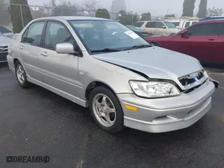 2002 Mitsubishi Lancer OZ-Rally with VIN JA3AJ86E92U038601, listed as a IAAI auction lot 41025991 with 162,450 mi miles. Bid and sale history available at carsss.com. Image 1.
