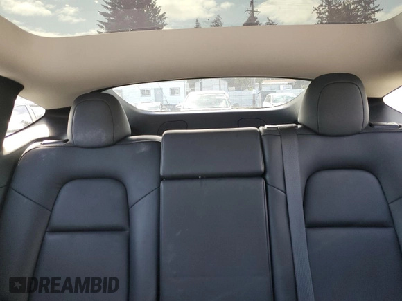 2024 Tesla Model Y Long Range with VIN 7SAYGAEE8RF987571, listed as a Copart auction lot 55110485 with 19,732 mi miles and Salvage title. Bid and sale history available at DreamBid. Image 10.