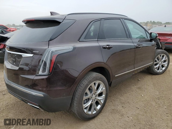2021 Cadillac XT5 AWD Sport with VIN 1GYKNGRS2MZ142286, listed as a Copart auction lot 60699515 with 17,406 mi miles and Salvage title. Bid and sale history available at DreamBid. Image 3.