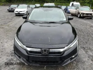 2018 Honda Clarity Touring z VIN JHMZC5F38JC007547, wystawiony jako Copart lot #57199735 z przebiegiem 176 149 mil mil oraz Czysty tytuł • Clean title. Historia ofert i sprzedaży dostępna na DreamBid. Obrazek 5.