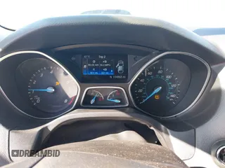 2014 Ford Focus Titanium with VIN 1FADP3J28EL354505, listed as a IAAI auction lot 42025966 with 104,868 mi miles. Bid and sale history available at carsss.com. Image 7.