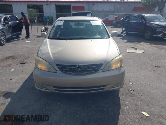 2003 Toyota Camry LE with VIN 4T1BE30K83U176834, listed as a IAAI auction lot 41307922 with 182,019 mi miles and . Bid and sale history available at DreamBid. Image 12.