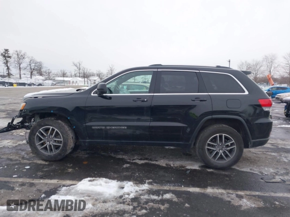2019 Jeep Grand Cherokee Laredo E with VIN 1C4RJFAGXKC834233, listed as a IAAI auction lot 41392437 with 81,005 mi miles. Bid and sale history available at carsss.com. Image 15.