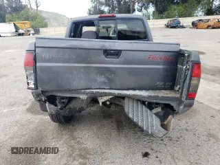 2000 Nissan Frontier XE with VIN 1N6ED27T5YC426456, listed as a Copart auction lot 54411425 with 117,600 mi miles and Salvage title. Bid and sale history available at DreamBid. Image 6.