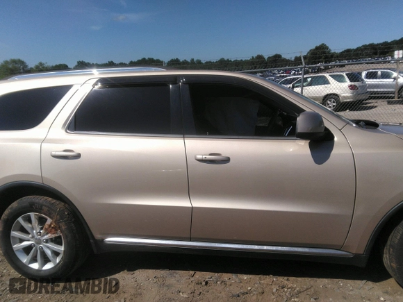 2014 Dodge Durango SXT with VIN 1C4RDHAG4EC266777, listed as a IAAI auction lot 42490301 with 210,544 mi miles and . Bid and sale history available at DreamBid. Image 13.