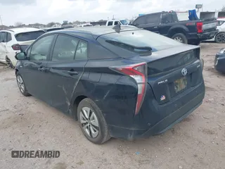 2017 Toyota Prius Two with VIN JTDKBRFU2H3052287, listed as a IAAI auction lot 41507689 with 82,205 mi miles and . Bid and sale history available at carsss.com. Image 3.