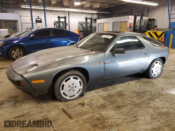 1984 Porsche 928 z VIN WP0JB0925ES861303, wystawiony jako Copart lot #41979575 z przebiegiem 114 593 mil mil oraz Nie do naprawy • Non repairable. Historia ofert i sprzedaży dostępna na DreamBid. Obrazek 1.
