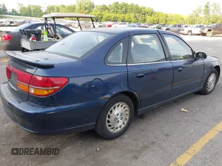 2001 Saturn LS z VIN 1G8JU52F91Y520315, wystawiony jako IAAI lot #42462566 z przebiegiem Nie podano mil oraz . Historia ofert i sprzedaży dostępna na DreamBid. Obrazek 4.