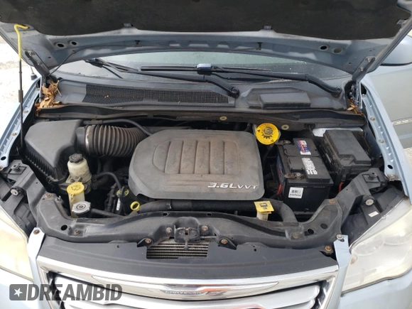 2013 Chrysler Town & Country Touring with VIN 2C4RC1BG7DR539032, listed as a Copart auction lot 71393964 with 115,365 mi miles and Salvage Title. Bid and sale history available at DreamBid. Image 12.