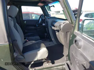 2007 Jeep Wrangler X with VIN 1J8FA24197L205095, listed as a IAAI auction lot 41388452 with 127,051 mi miles and . Bid and sale history available at carsss.com. Image 5.