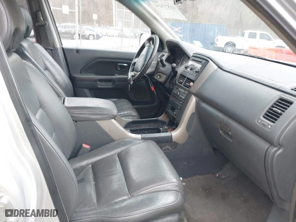 2006 Honda Pilot EX-L with RES with VIN 2HKYF18606H502115, listed as a IAAI auction lot 41872434 with 286,953 mi miles. Bid and sale history available at carsss.com. Image 5.