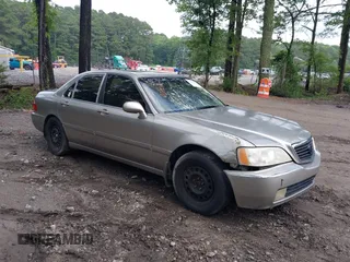 2002 Acura RL with VIN JH4KA96682C009762, listed as a IAAI auction lot 42450219 with 207,765 mi miles and . Bid and sale history available at DreamBid. Image 1.