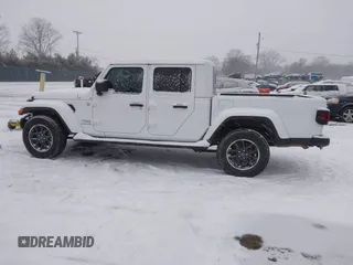 2023 Jeep Gladiator Overland z VIN 1C6HJTFG6PL544489, wystawiony jako IAAI lot #41311654 z przebiegiem 37 630 mil mil oraz . Historia ofert i sprzedaży dostępna na DreamBid. Obrazek 14.